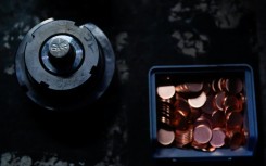 The dies used to press the last pennies along with the planchets, or blank disks that will become coins, at the US Mint