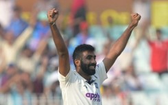 India's Jasprit Bumrah celebrates after taking five-wicket haul during the first day of the first Test cricket match against South Africa at the Eden Gardens in Kolkata