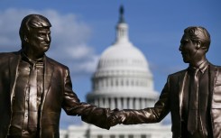 A statue depicting US President Donald Trump and Jeffrey Epstein holding hands is seen near the US Capitol on October 2, 2025