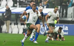 Replacement scrum-half Grant Williams (C) scored the third of South Africa's tries in their 32-14 win over Italy in Turin