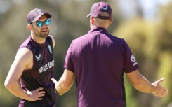 England's Mark Wood (L) bowled in the nets ahead of the first Test against Australia
