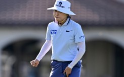 South Korea's Lee So-mi reacts after making an eagle putt on the 17th hole to help grab the lead after the opening round of the LPGA Tour Championship