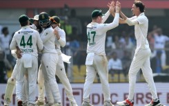 South Africa's Marco Jansen (R) celebrates with teammates after taking the wicket of India's Nitish Kumar Reddy