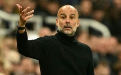 Manchester City manager Pep Guardiola gestures on the touchline during his team's defeat at Newcastle