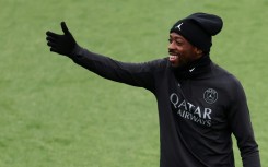 Ousmane Dembele is all smiles in training with his Paris Saint-Germain teammates on Tuesday, on the eve of their Champions League clash with Spurs