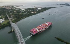 A Taiwanese cargo ship sails out of the Panama Canal on the Pacific side