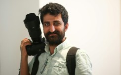 Agence France-Presse's Turkish photographer Yasin Akgul was arrested at his home at dawn on March 24