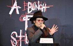 US actor Johnny Depp opened an exhibition of dozens of his artworks in Tokyo