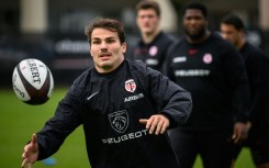 Antoine Dupont (C) joined Toulouse in 2017