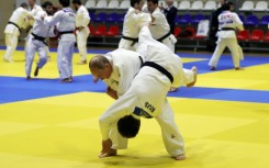 Russian President Vladimir Putin (L) is a keen judo enthusiast and holder of a black belt in the sport