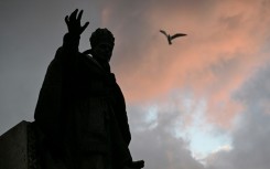 A statue of Pope Benedict XV outside Istanbul's Cathedral of the Holy Spirit where Leo attends prayers on Friday