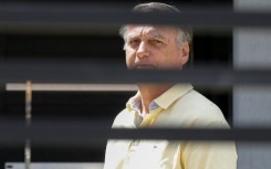 Bolsonaro was taken into custody from home confinement after tampering with his ankle monitor