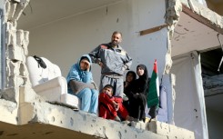 But the backdrop told a different story: dilapidated buildings, piles of concrete and rubble, the scars of two years of conflict in Gaza