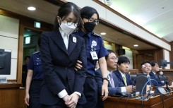 South Korea's former first lady Kim Keon Hee (L) was arrested in August and is under investigation over an alleged stock manipulation scheme and for accepting gifts from the Unification Church