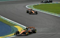McLaren's Lando Norris (bottom) and Oscar Piastri have duelled all season for the world championship title