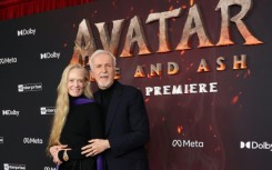 Canadian director James Cameron and his wife, US actress Suzy Amis Cameron, attend the premiere of "Avatar: Fire and Ash" in Hollywood on December 1