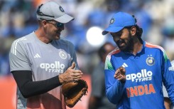 India's captain KL Rahul speaks with bowling coach Morne Morkel after winning the toss