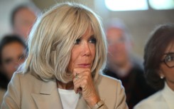 Brigitte Macron objected to the methods of feminists who disrupted a comedy show, her office said