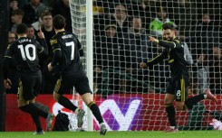 Manchester United's Bruno Fernandes (R) celebrates scoring against Wolves