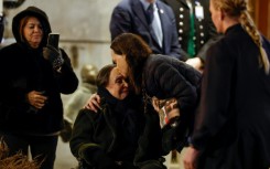 Nobel peace laureate Maria Corina Machado kisses her mother Corina Parisca Perez as she greets supporters in Oslo