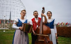 Members of the yodelling trio 'Rond Om de Santis' performing in the garden of UNESCO's headquarters in Paris