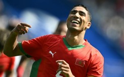 Achraf Hakimi celebrates scoring for Morocco at the 2024 Olympic Games in Paris