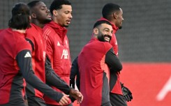 Liverpool striker Mohamed Salah (C)