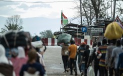 Displaced Burundian nationals attempt to return home following the closure of the border between the Democratic Republic of Congo and Burundi at the Kavimvira checkpoint