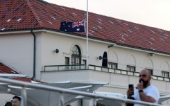 Flags fly at half mast in Australia to remember those killed at Bondi Beach