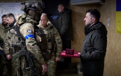 President Volodymyr Zelensky with Ukrainian forces in Kupiansk, Kharkiv region, on December 12, 2025