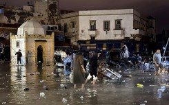 Residents were left wading through the town centre of Safi, a Moroccan coastal town, after a flash flood destroyed 70 homes and businesses and left at least 37 dead