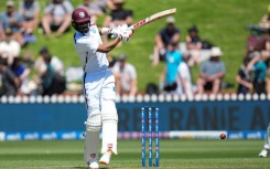 Roston Chase plays a shot during day the second Test