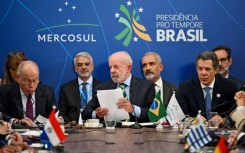 Brazil's President Luiz Inacio Lula da Silva (C) warned about spiraling tensions between Washington and Caracas as he opened a summit of the South American Mercosur bloc