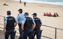 Police officers patrolled at Bondi Beach on Christmas Day as Australia's Prime Minister spoke of "sorrow" over a recent attack there