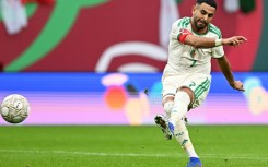 Algeria captain Riyad Mahrez scores his second goal against Sudan in Rabat.