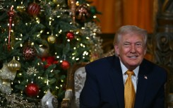 US President Donald Trump participates in NORAD Santa tracker phone calls, on Christmas Eve, from his Mar-a-lago club in Florida