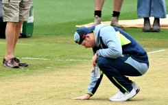 Australia captain Steve Smith inspects the wicket at the Melbourne Cricket Ground (MCG) ahead of the fourth Ashes Test