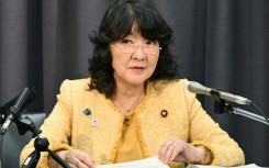 Japan's cabinet, including Finance Minister Satsuki Katayama, approved a record budget for the coming fiscal year of 122.3 trillion yen ($782 buillion), larger than the current year's 115 trillion yen