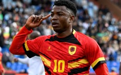 Gelson Dala celebrates scoring for Angola against Zimbabwe in Marrakesh.