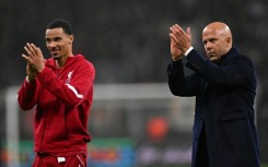 Liverpool striker Hugo Ekitike and coach Arne Slot after their 5-1 win away to Eintracht Frankfurt in the Champions League