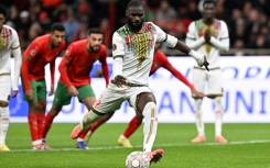 Lassine Sinayoko scores from the penalty spot for Mali against Morocco in Friday's Africa Cup of Nations clash