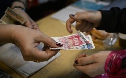 Bulgarians will still be able to pay for items in shops with the lev for a month