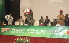 The head of Niger's military government General Abdourahamane Tiani (C), Mali's Colonel Assimi Goita (L) and Burkina Faso's leader Captain Ibrahim Traore (R) formed a confederation in 2023