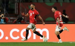 Egypt captain Mohamed Salah (L) celebrates after scoring the goal that clinched a 3-1 AFCON victory over Benin in Agadir