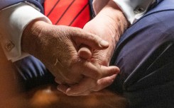 US President Donald Trump blames aspirin for bruises on his hand