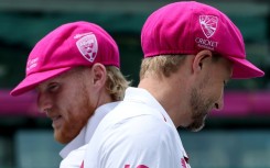England captain Ben Stokes (L) and Joe Root (R) after a team photograph at the Sydney Cricket Ground