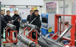 This picture taken on January 3, 2026 and released by North Korea's official Korean Central News Agency (KCNA) via KNS on January 4, 2026 shows North Korean leader Kim Jong Un visiting a factory involved in making tactical guided weapons, at an undisclosed place in North Korea