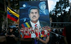 Supporters of leftist Venezuelan leader Nicolas Maduro demonstrate in the streets of Caracas a day after he was captured in a US strike