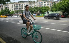 Author Hu Anyan was one of the millions of delivery drivers powering China's retail giants