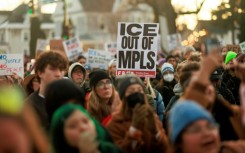 Thousands of protesters took to the frigid streets of Minneapolis after the shooting, holding signs reading 'ICE out of MPLS,' a common abbreviation for the city